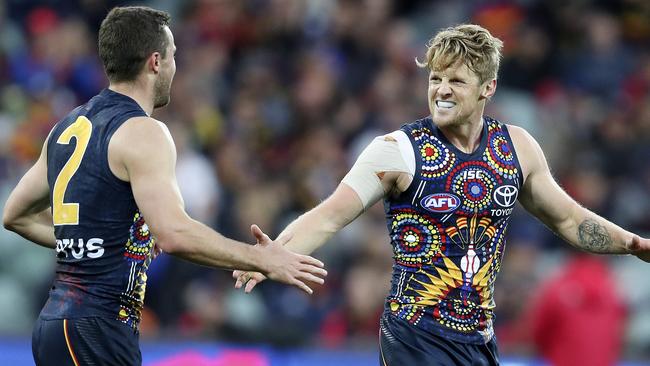 Rory Sloane celebrates a goal against the Eagles with midfield sidekick Brad Crouch. Picture SARAH REED