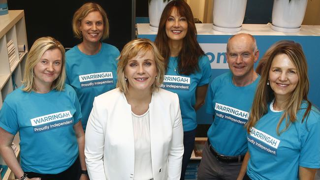 Steggall inside the hub with volunteers Tina Bradstreet, Ann-Charlott Paduch, Tina Jackson, Chris Chapman and Sally Guyatt. Picture: John Appleyard