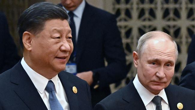 Russia's President Vladimir Putin (R) and China's President Xi Jinping at the Great Hall of the People in Beijing.