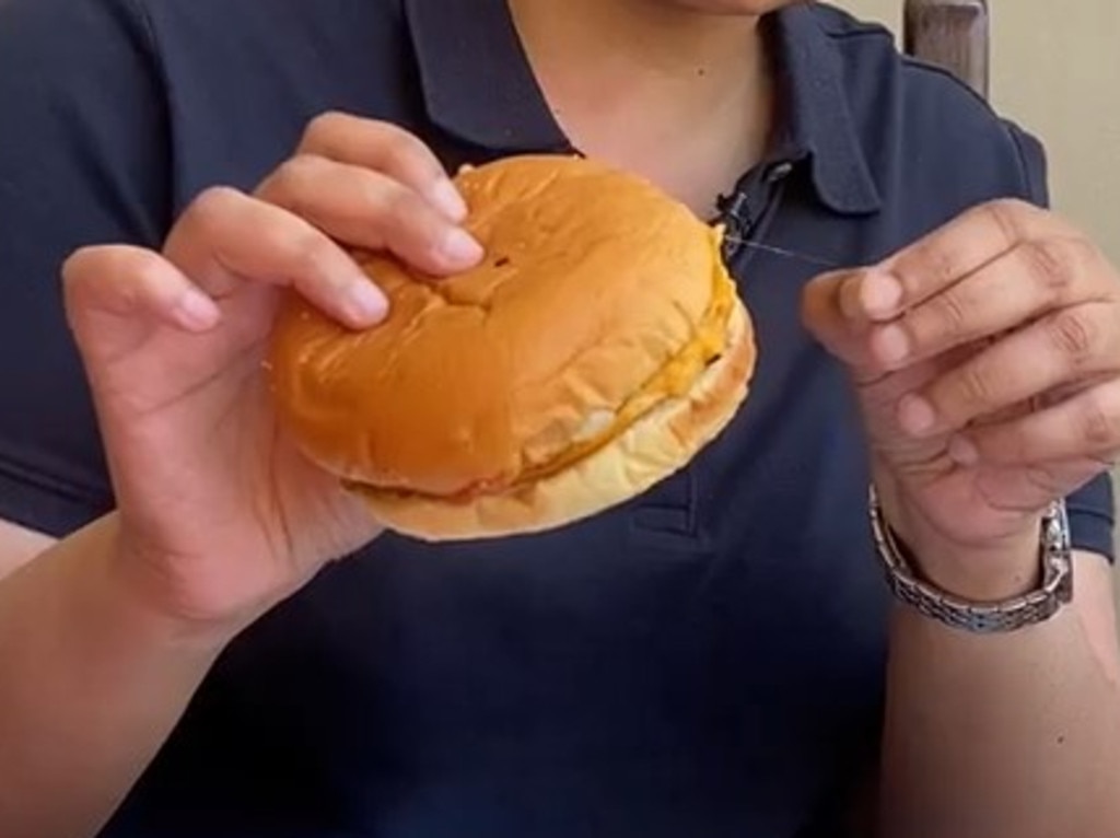 Found a hair in my “not a cheeseburger”. Picture: news.com.au