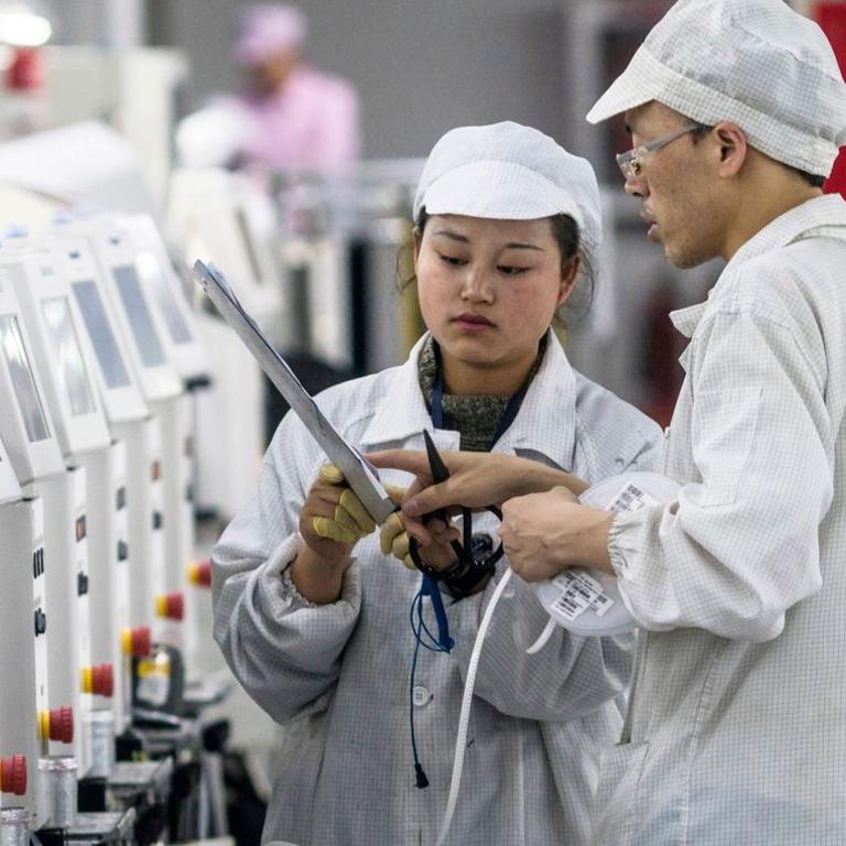 Foxconn workers at a factory in Guizhou Province, China, in 2018. Picture: Aleksandar Plavevskiepa/Shutterstock