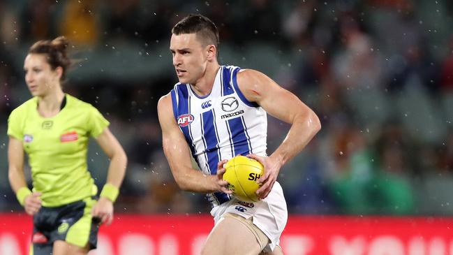 ADELAIDE, AUSTRALIA - AUGUST 22: Luke Davies-Uniacke of the Kangaroos during the 2021 AFL Round 23 match between the Adelaide Crows and the North Melbourne Kangaroos at Adelaide Oval on August 22, 2021 in Adelaide, Australia. (Photo by Sarah Reed/AFL Photos via Getty Images)