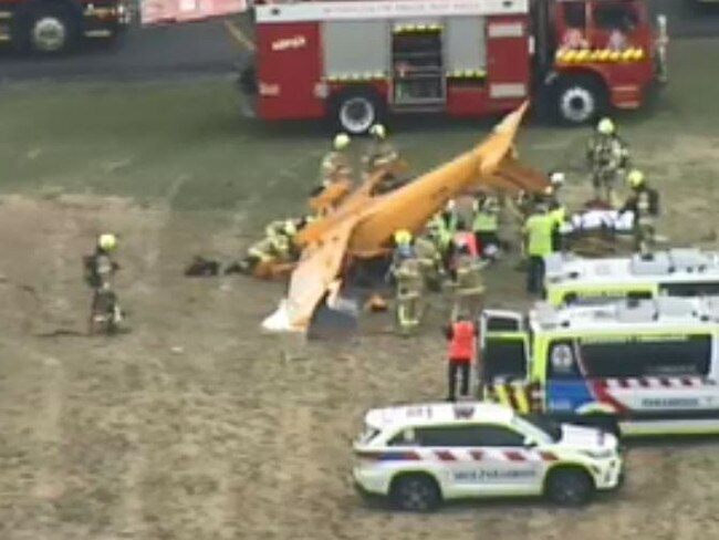 Emergency crews at December’s plane crash at Moorabbin Airport. Picture: @KateMcG6