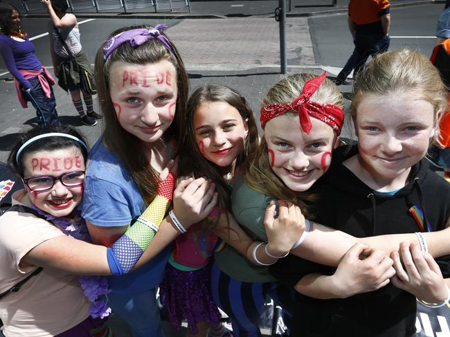 The Pride Parade from North Hobart to Parliament Lawns. in Hobart,, Campbell st primary girls who are leading the parade with the banner, from left, Ruby Harrison-Buzzacott Maggie Staines, Kiora Hogan, Ada Harrison-Burnett and Meiren Swift,