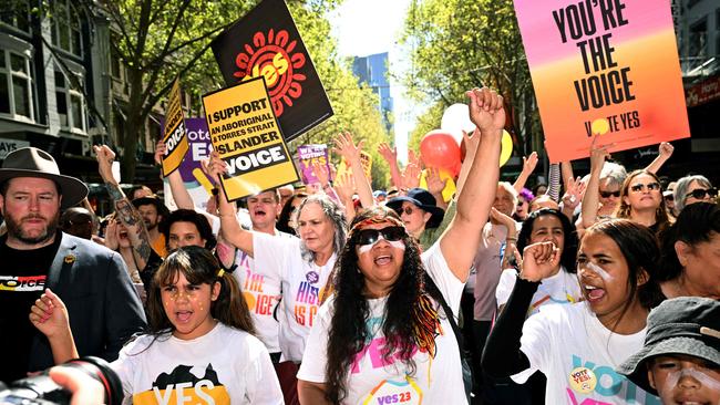 Crowds march during a “Walk for Yes” rally in Melbourne.