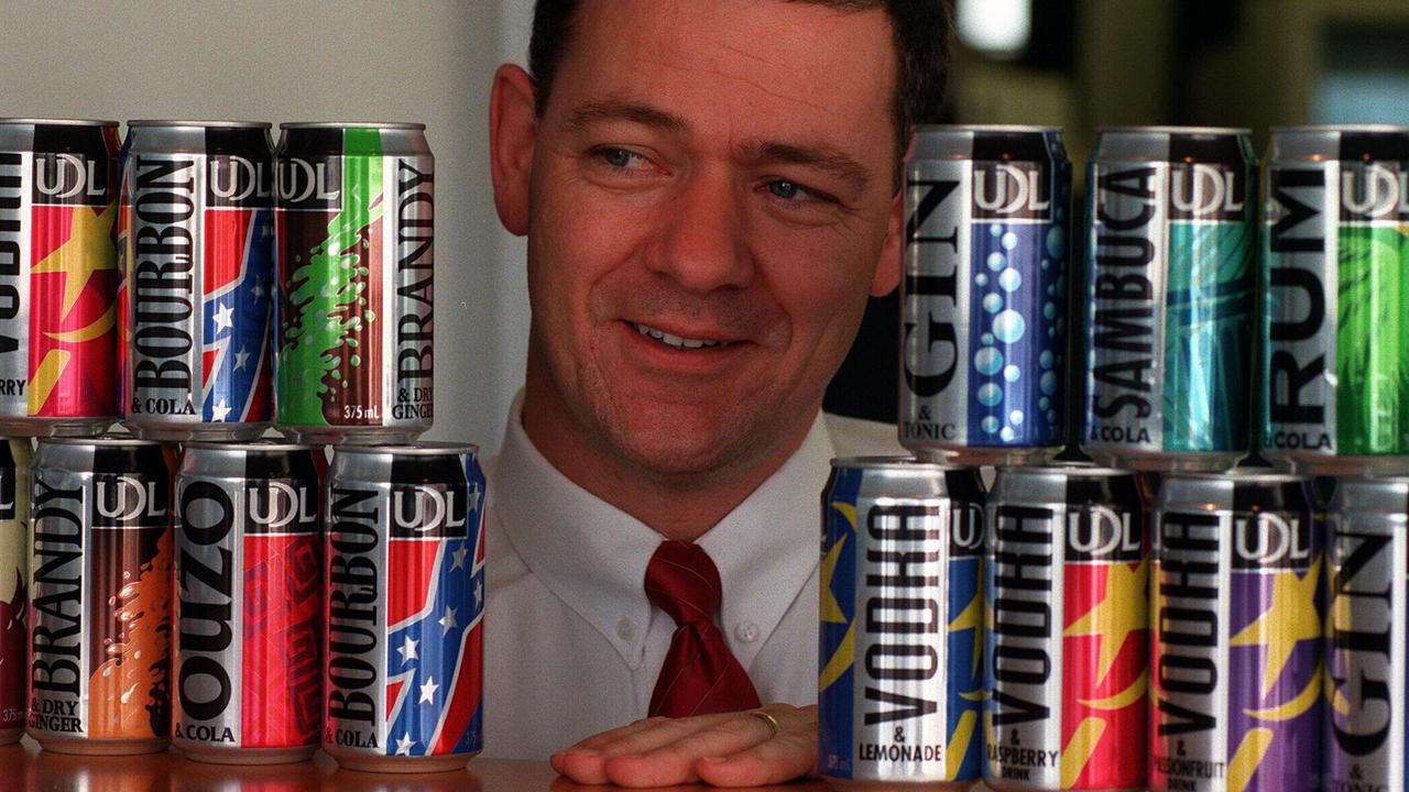 Here’s another flashback photo when the cans had undergone makeover in 1996 with the then UDL marketing director Kim Manley showing off the new style. Picture: Supplied