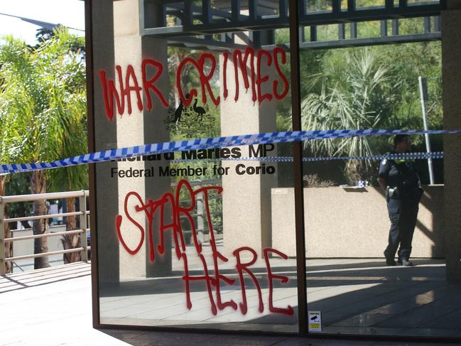 Protestors have attacked Richard Marles' office in Brougham Street, daubing graffiti and smashing a window. Picture: Alan Barber