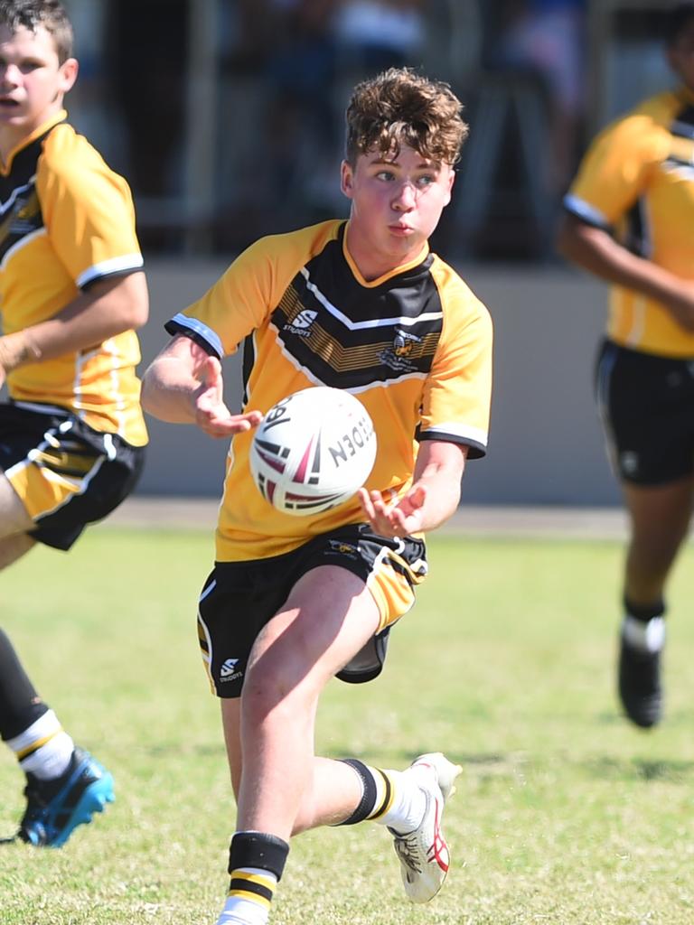 Boys Rugby League State Championship held at Northern Division, Brothers Leagues ground, Townsville. 14-15 years. Capricornia (gold) v South West (blue). Archie Lloyd of The Cathedral College, Rockhampton.