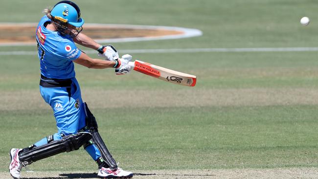 There it goes! Strikers opening batter Sophie Devine hits a six against Melbourne Stars. She was dropped twice in this game, when she was on one run and then four runs. Picture: JAMES ELSBY/GETTY IMAGES