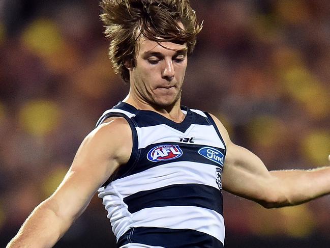 ADELAIDE, AUSTRALIA - MAY 13: Cory Gregson of the Cats kicks the ball during the round eight AFL match between the Adelaide Crows and the Geelong Cats at Adelaide Oval on May 13, 2016 in Adelaide, Australia. (Photo by Daniel Kalisz/Getty Images)