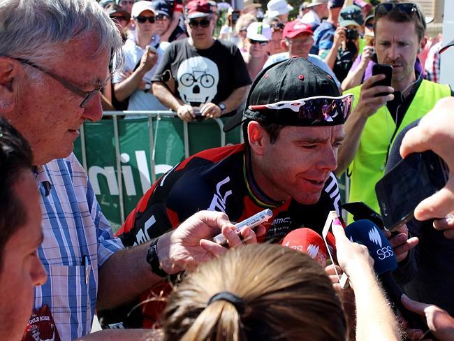 The media pack swarms around Cadel Evans after the men's road race. Picture: Reece Homfray