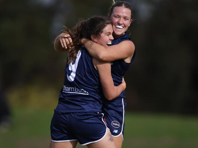 Big V players celebrate a goal in the win. Photo: Aussies in Action.