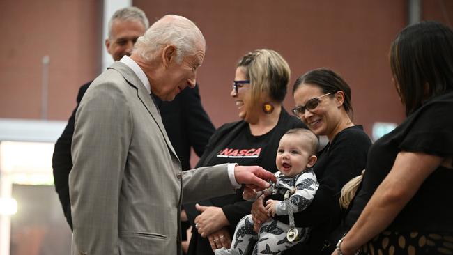 King Charles III smiles at a baby during his visit to the National Centre of Indigenous Excellence on October 22 in Sydney. Picture: Victoria Jones - Pool/Getty Images