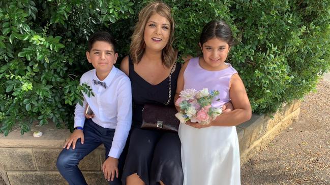 Renee Chahine developed a swollen sore arm she thought she may have needed physiotherapy, instead it was a shock cancer diagnosis. Pictured here with her son Ralph and daughter Ella. Picture: Supplied