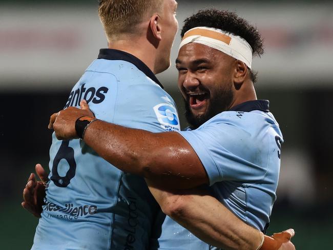 Hugh Sinclair and Mahe Vailanu celebrate the win. Picture: Travis Hayto/Getty Images