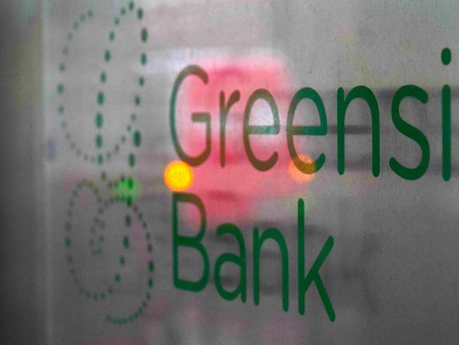 Picture taken on March 15, 2021 shows the logo of the Greensill bank at its headquarters in Bremen, northern Germany. - Germany's financial watchdog Bafin froze the operations of the German banking subsidiary of troubled British group Greensill Capital, citing on March 3, 2021 an "imminent risk" of over-indebtedness. (Photo by Patrik Stollarz / AFP)