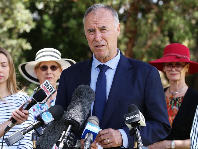 SUNDAY TELEGRAPH - 11/11/17Liberal politician for the seat of Bennelong in Sydney, John Alexander announces his resignation at a press conference in Putney today after revealing he may be a dual citizen. John's family in the background.