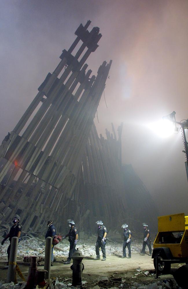 A flashback to firefighters making their way through the rubble of the World Trade Center in New York after two hijacked planes flew into the landmark skyscrapers. Picture: AFP