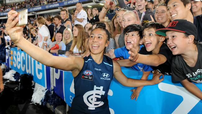 Darcy Vescio celebrates Carlton’s win with fans at Ikon Park.