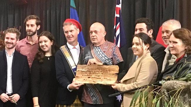 Moreland Council has three new names to choose from following a special meeting which included a scroll handover. (L-R) Cr James Conlan, Cr Adam Pulford, Cr Angelica Panapoulos, Mayor Mark Rily, Uncle Andrew Gardiner, Cr Lambros Tapinos, Cr Carli Hannan and Cr Monica Harte.