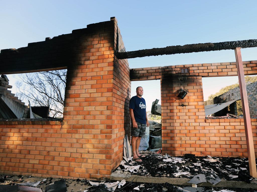 Property owner-Grant Dowdle, 49 years, at his rental property at 8 Francis Hellis Drive which was totally destroyed in the fire. The seaside town of Tathra on the NSW south coast, has lost almost 100 homes. Picture Gary Ramage