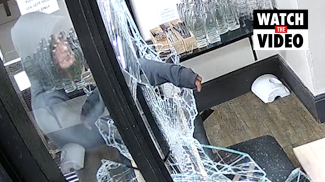 Thief smashes way into Hobart shops