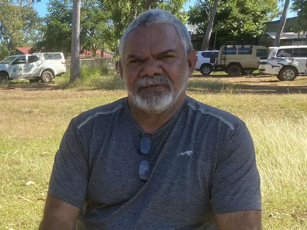 Matthew McKenzie sits on a rock outside the council office in Angurugu on Groote Eylandt. Picture: Matt Cunningham