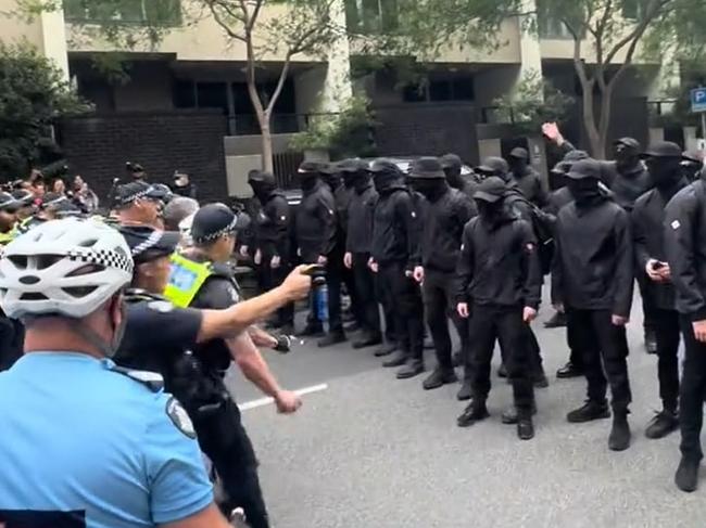 Police confront a group of suspected neo-Nazi at a pro-refugee rally. Picture: TikTok/permanentvisaforrefugees