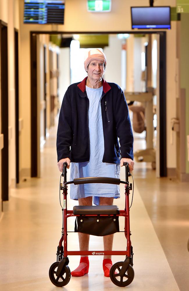 Ronel Gartrell, 67, at Northern Beaches Hospital after battle for life against the flu. In the days before he was sick he was working on guttering at his home. Now he needs rehabilitation to build up his strength. Picture: Troy Snook,