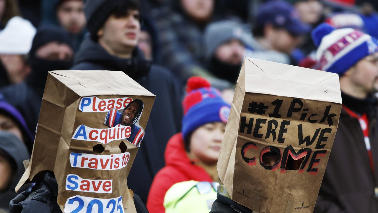 FOXBOROUGH, MASSACHUSETTS - JANUARY 05: Fans wearing bags watch the game between the New England Patriots and the Buffalo Bills at Gillette Stadium on January 05, 2025 in Foxborough, Massachusetts. (Photo by Rich Gagnon/Getty Images)