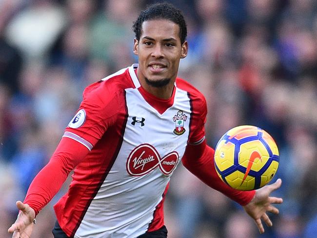 (FILES) This file photo taken on October 29, 2017 shows Southampton's Dutch defender Virgil van Dijk chases the ball during the English Premier League football match between Brighton and Hove Albion and Southampton at the American Express Community Stadium in Brighton, southern England on October 29, 2017. Liverpool have signed Southampton's Virgil van Dijk, a statement on the club's website said on December 27, 2017, for a reported £75 million ($100 million, 84 million euros) in a deal that will make him the world's most expensive defender. / AFP PHOTO / Glyn KIRK / RESTRICTED TO EDITORIAL USE. No use with unauthorized audio, video, data, fixture lists, club/league logos or 'live' services. Online in-match use limited to 75 images, no video emulation. No use in betting, games or single club/league/player publications.  /