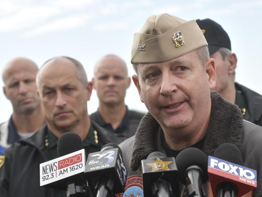 Navy Capt. Tim Kinsella briefs members of the media following a shooting at the Naval Air Station in Pensacola. Picture: Tony Giberson/Pensacola News Journal via AP