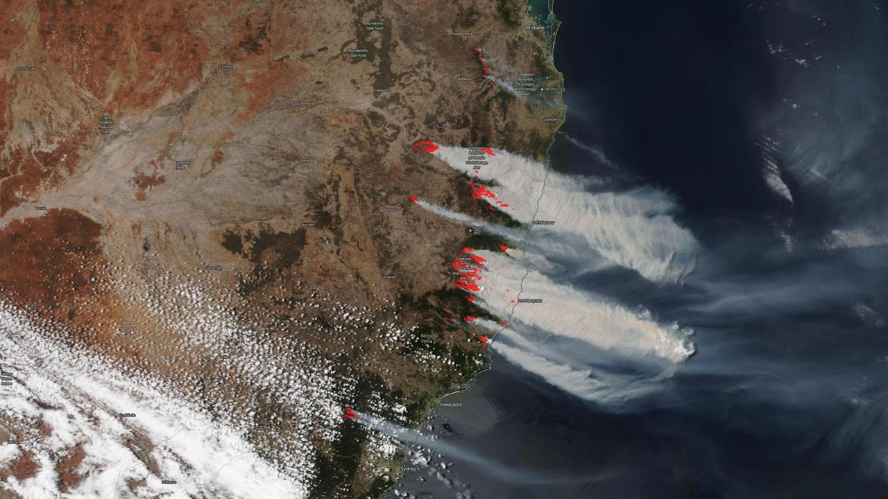 A satellite image shows smoke from last summer’s bushfires. A royal commission report found the smoke contributed to the deaths of hundreds of people. (AAP Image/Supplied, JPSS)