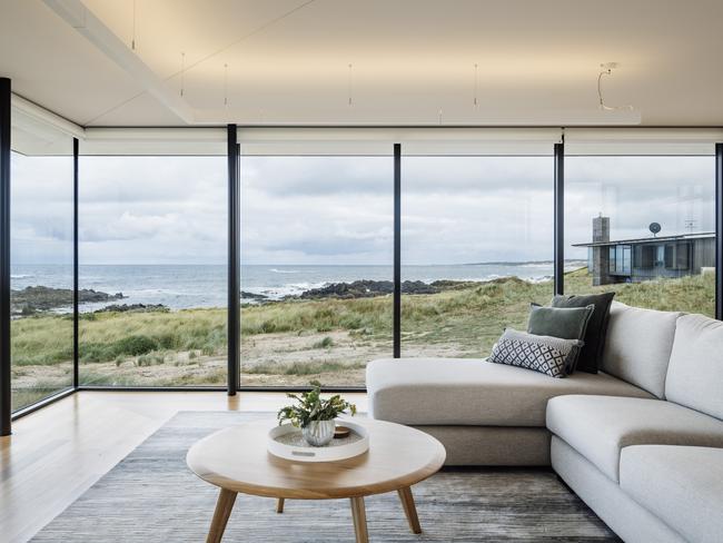 The north-facing living area with comfy, chaise sofa lounge in Ettrick Rocks’ Australina retreat is the perfect spot to relax and unwind and take in the stunning views. Picture: Adam Gibson