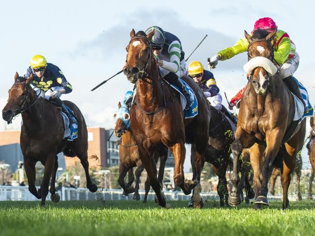 MELBOURNE, AUSTRALIA - JULY 13: Thomas Stockdale riding Marble Nine (r) defeats Tom Madden riding Major Share in Race 7, the Sportsbet Get On Extra Handicap - Betting Odds during Melbourne Racing at Caulfield Racecourse on July 13, 2024 in Melbourne, Australia. (Photo by Vince Caligiuri/Getty Images)