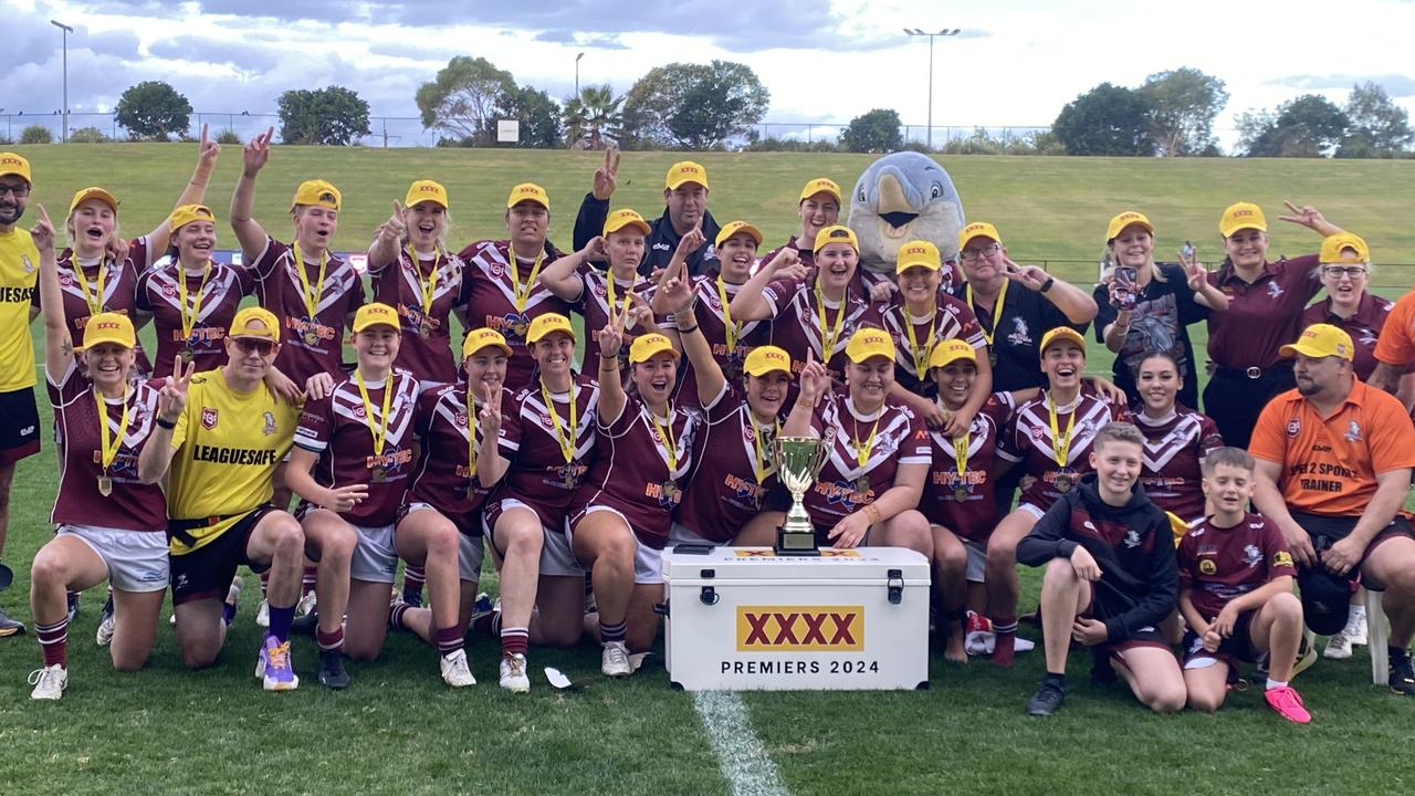 Kawana Dolphins celebrate winning the 2024 open women's Sunshine Coast rugby league grand final.