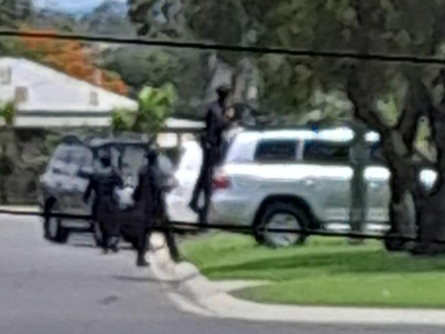 Heavily armed police swarm on home after police track wanted teens