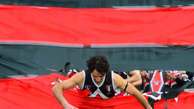 Pictured is the Peninsula Football Netball League Australian Rules Football round 14 game Bonbeach (red,black,white with black shorts) versus Karingal (red and white with white shorts) at Bonbeach Reserve. The game featured Bonbeach stalwart Daniel Smith's 300th game. Picture: Derrick den Hollander