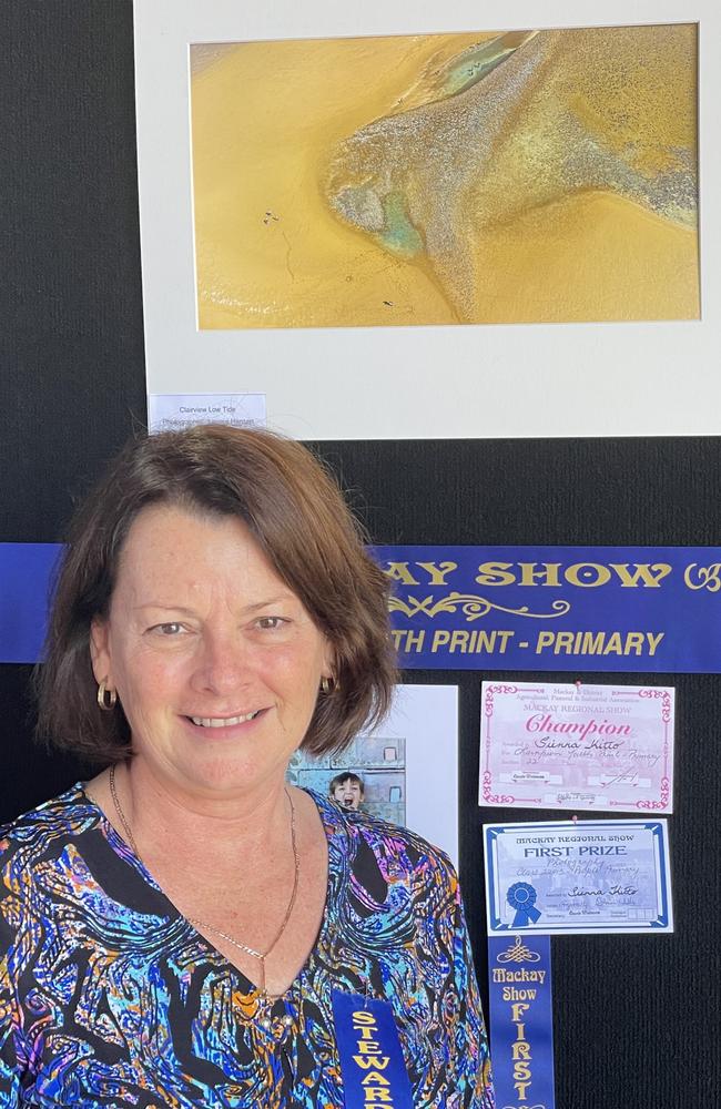 Lenore Hansen from Mount Pleasant and the Creative Shots Photo Club with her award-winning photograph 'Clairview Low Tide'. Mackay Show June 15 2022. Picture: Max O'Driscoll.