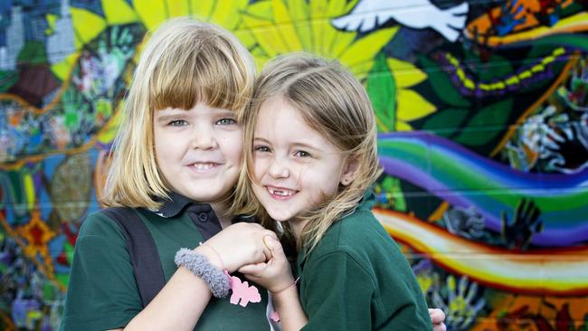 Caboolture State School prep students are back at school after COVID-19 restrictions are eased. Lucy and Amelia are happy to be back at school. June 17, 2020. Picture: Renae Droop