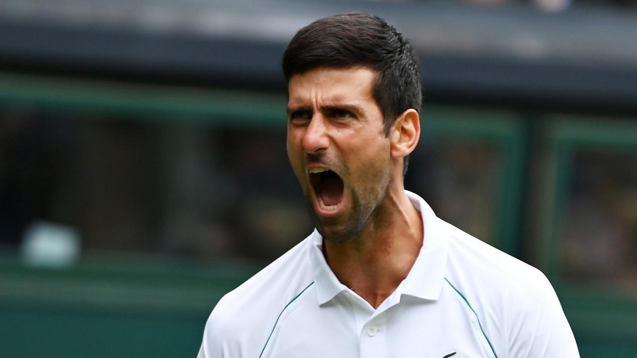 LONDON, ENGLAND - JUNE 30: Novak Djokovic of Serbia celebrates in his Men's Singles Second Round match against Kevin Anderson of South Africa during Day Three of The Championships - Wimbledon 2021 at All England Lawn Tennis and Croquet Club on June 30, 2021 in London, England. (Photo by Mike Hewitt/Getty Images)