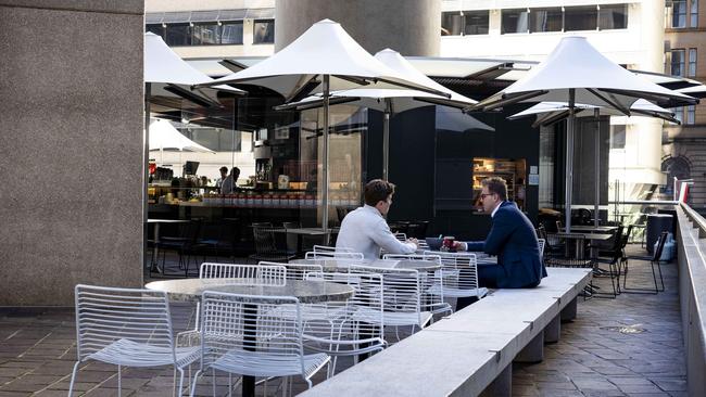 An increasing number of empty chairs and tables are evident across Sydney's CBD during weekday lunchtimes. Photo: Tom Parrish