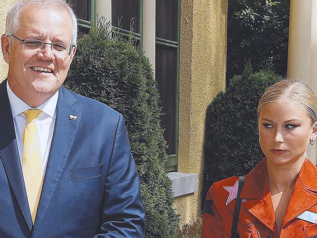 CANBERRA, AUSTRALIA NewsWire Photos JANUARY 25, 2022: Prime Minister Scott Morrison and his wife Jenny with Grace Tame, who appeared to be uncomfortable with the meeting. The PM spoke with at the 2022 Australian of the Year Finalists Morning Tea, at the Lodge in Canberra. Picture: NCA NewsWire / Gary Ramage Picture: NCA NewsWire / Gary Ramage