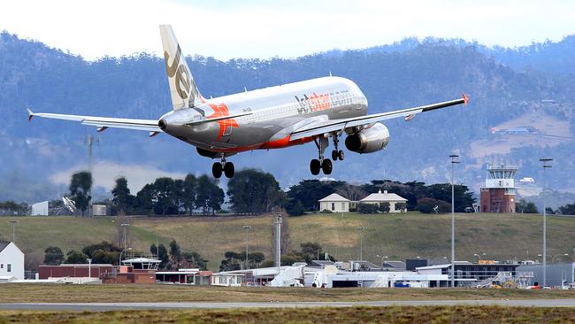 A Jetstar plane comes in to land at Hobart International Airport.