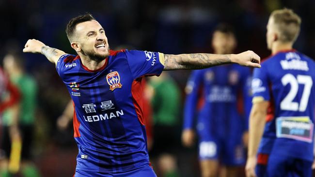 Roy O'Donovan of the Jets celebrates the win after the A-League semi final.