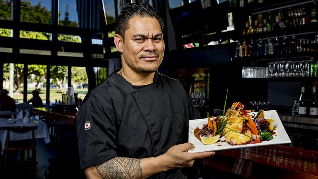 New Isle of Capri restaurant Moana owner Alex Kaihea with the Moana Surf and Turf. Picture: Jerad Williams