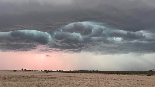 A storm delivers drenching rain to the Roma district. Picture: Lee White