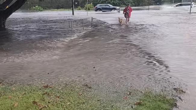 Facebook user Leanne Allford shared this photo of drivers taking a risk driving through flooded waters at the Gooseponds bridge along Malcomson St, North Mackay, January 12, 2023.