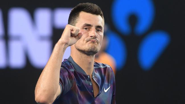 Bernard Tomic reacts after beating Tommy Paul in the second round of qualifying for the Australian Open. (AAP Image/Julian Smith)