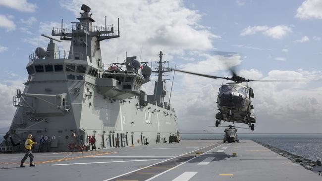 HMAS Adelaide is taking part in military exercises that have angered China.